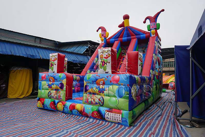 Lilytoys top selling clown theme inflatable slide for kids,  waterproof tarpaulin jumping playground