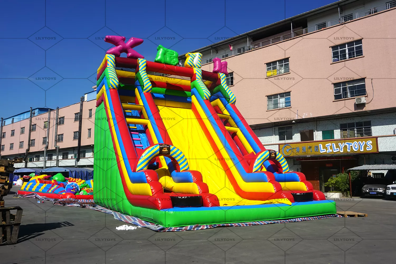 Inflatable high slide with letter