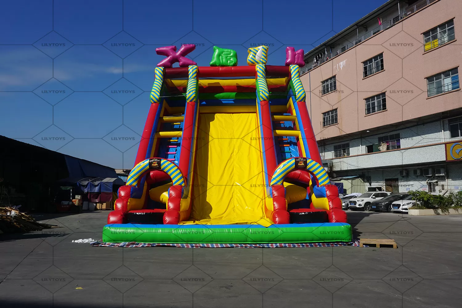 Inflatable high slide with letter