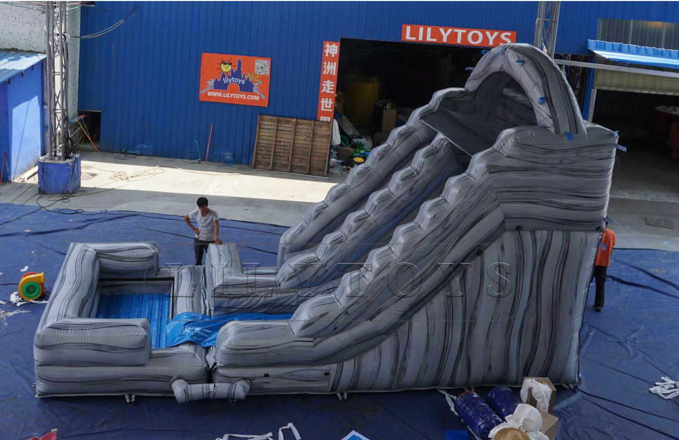 small grey inflatable water slide commercial use
