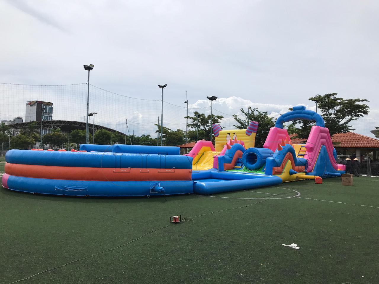 summer inflatable water obstacle with the pool