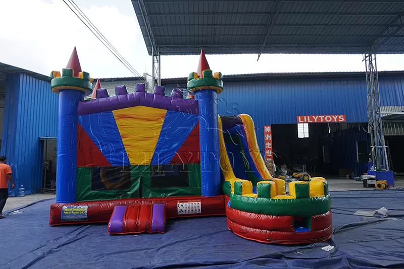 rainbow inflatable castle with slide