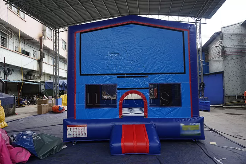 commercial inflatable bounce house with banner
