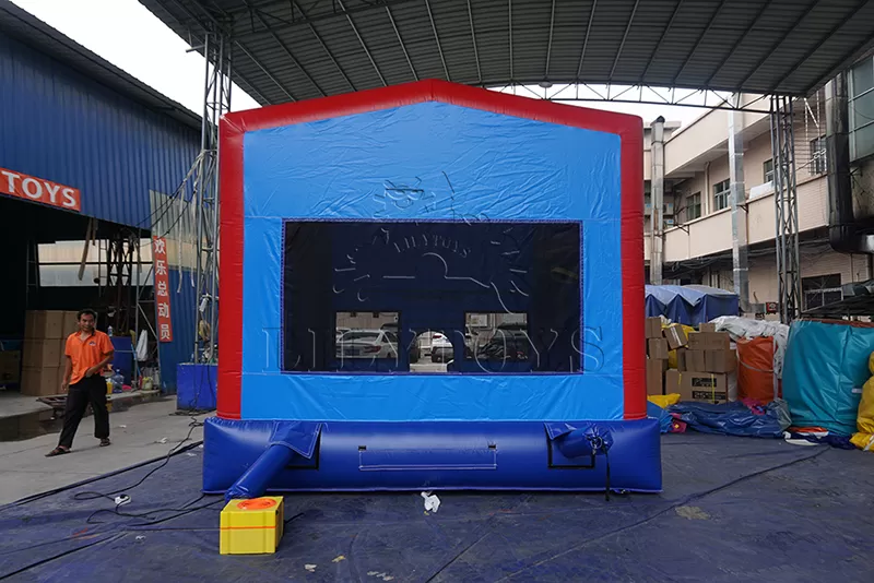 commercial inflatable bounce house with banner