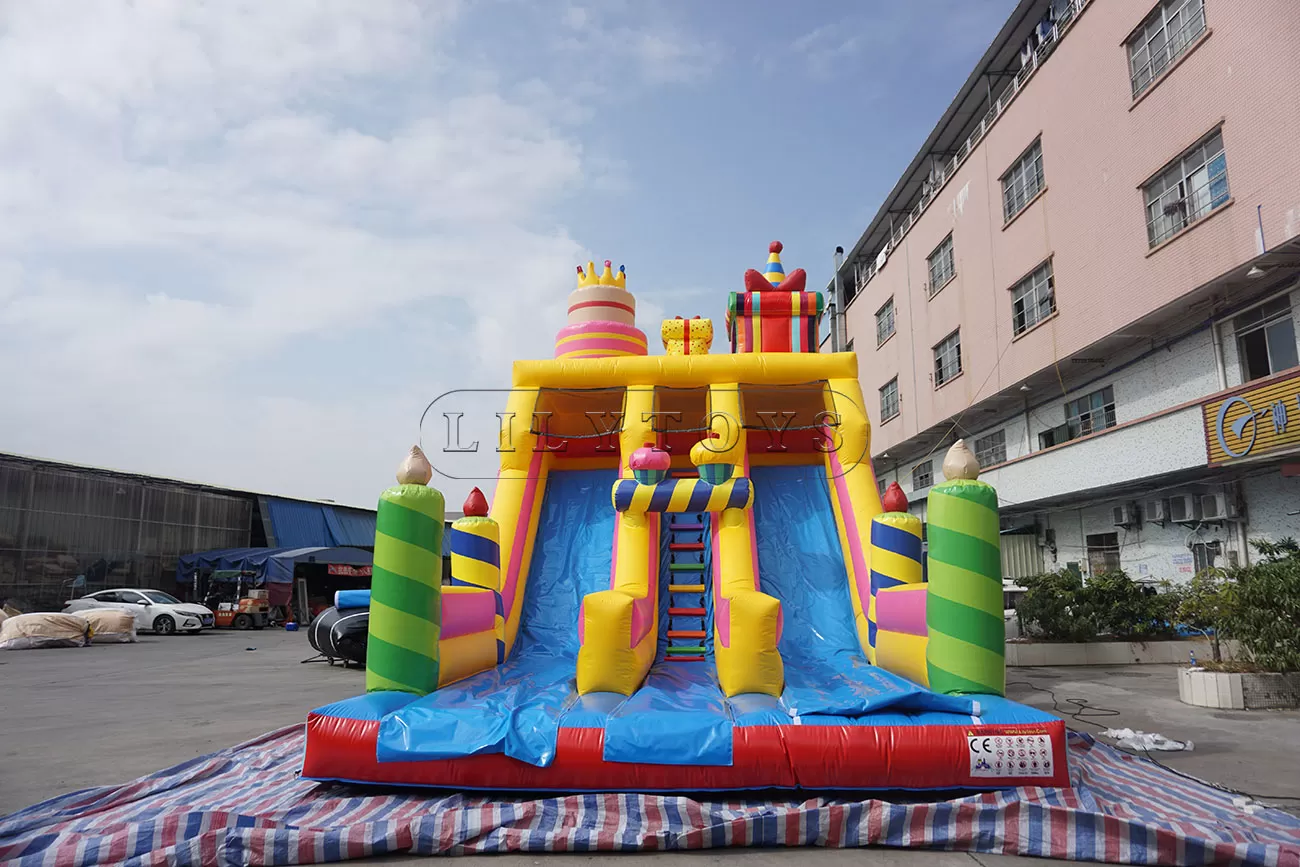 Birthday cake inflatable slide
