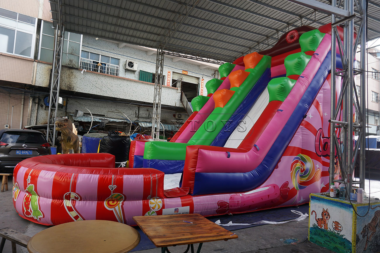 Candy themed inflatable water slide