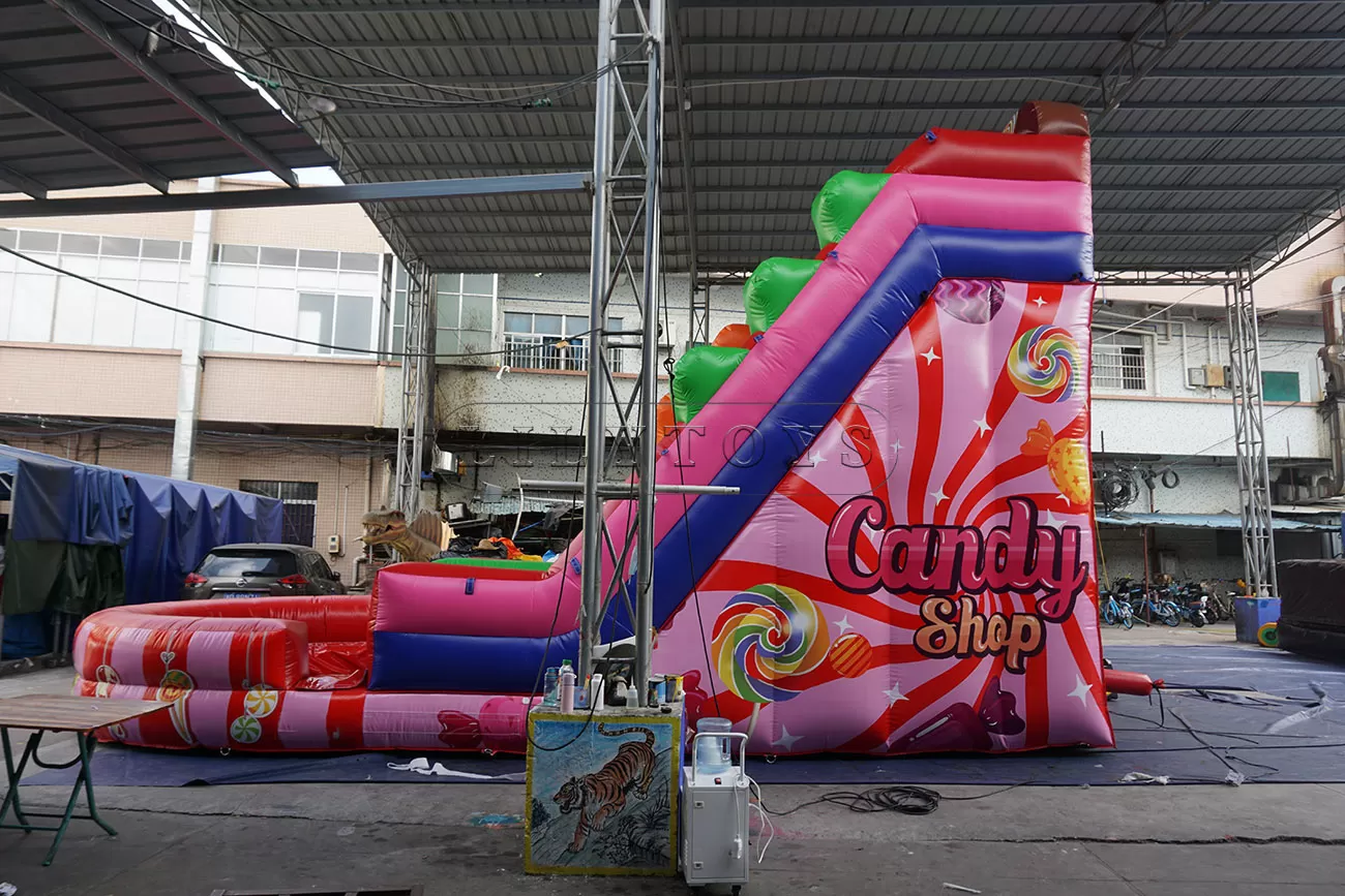 Candy themed inflatable water slide