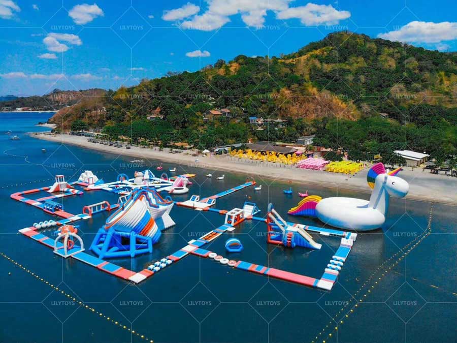 Lilytoys new design commercial large inflatable water sport floating inflatable aqua park adventure water park TUV obstacles course water slide