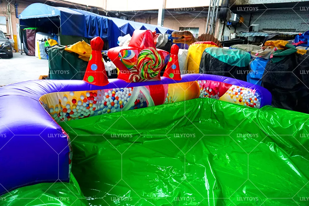 pink candy inflatable slide with pool