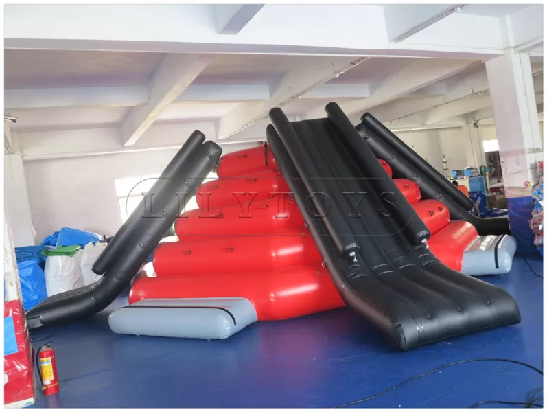 big inflatable tower with 4 slides