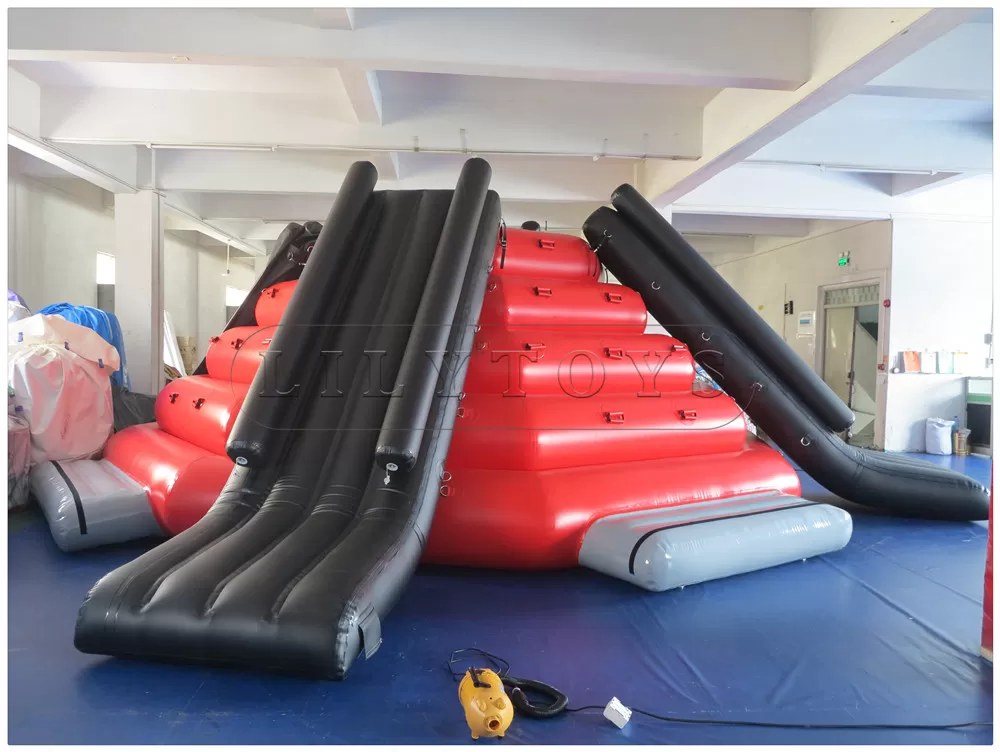 big inflatable tower with 4 slides