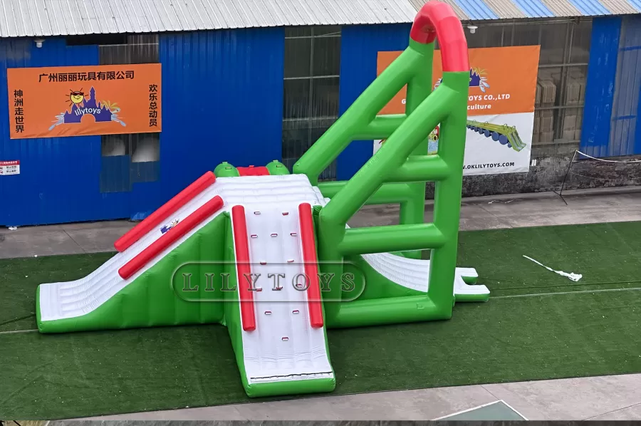 green inflatable water park water tower with swing