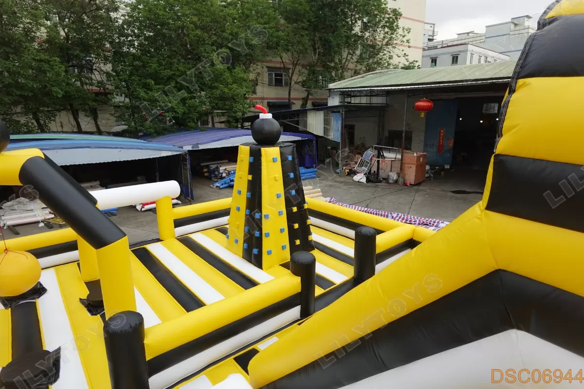orange and black inflatable bouncy castle for kids